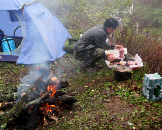 Preparing food in camp