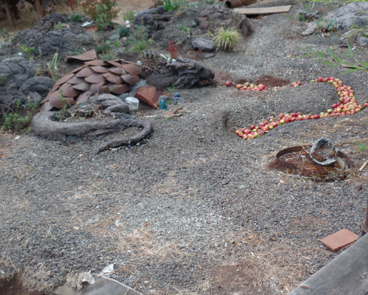 Darcy the dragon, made of cement and shovelheads, breathing apple fire. Darcy the dragon, made of cement and shovelheads, breathing apple fire.