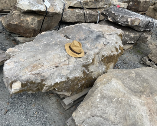 The centerpiece “Sitting Stone” boulder