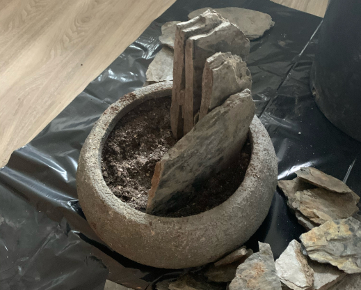 The process of building a crevice garden in a container. The process of building a crevice garden in a container.