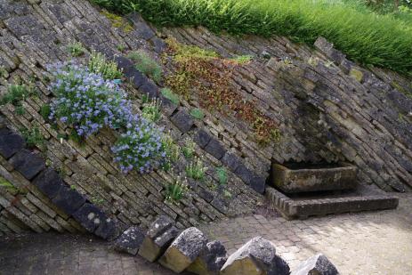 The current ‘Living Walls’ by the Alpine Glasshouse, made from recycled concrete.