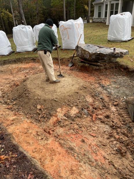 Site prepped with the central boulder in place